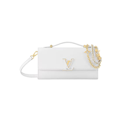 White handbag with gold chain and logo on a white background