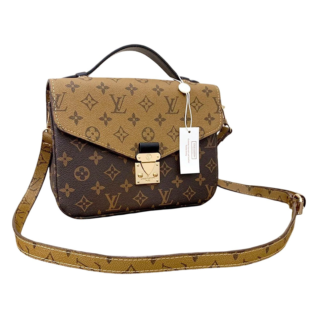 Designer handbag with monogram pattern and tag on a white background